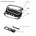 Key cover device with metal body, silicone cover, and screwdriver for installation on a white background.
