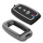 Black car key fob cover with buttons and gray key fob shell on a white background