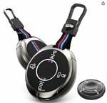 Key cover device with remote control and carabiner on a white background