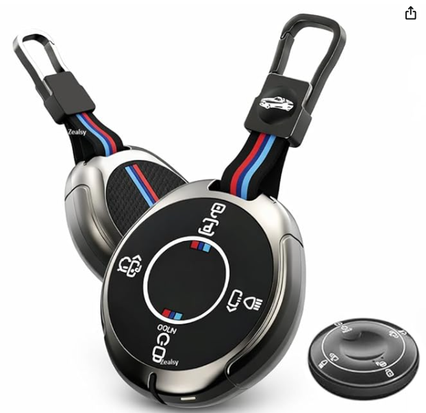 Key cover device with remote control and carabiner on a white background