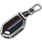 Key cover with black and red stripes on a white background