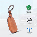 Brown leather key case with metallic ring on a light blue background, featuring icons and text about product features.