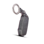 Key fob with leather strap on a white background
