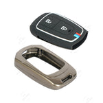 Black and silver car key fobs on a white background