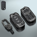 Black key cover with key fob attachment on a gray background