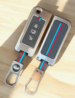 Keychain with car key simulation model on a wooden surface